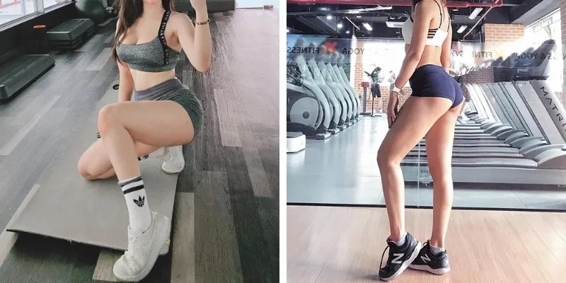CÔ GÁI ĐANG THỰC HIỆN ĐỘNG TÁC SQUAT TẠI PHÒNG GYM